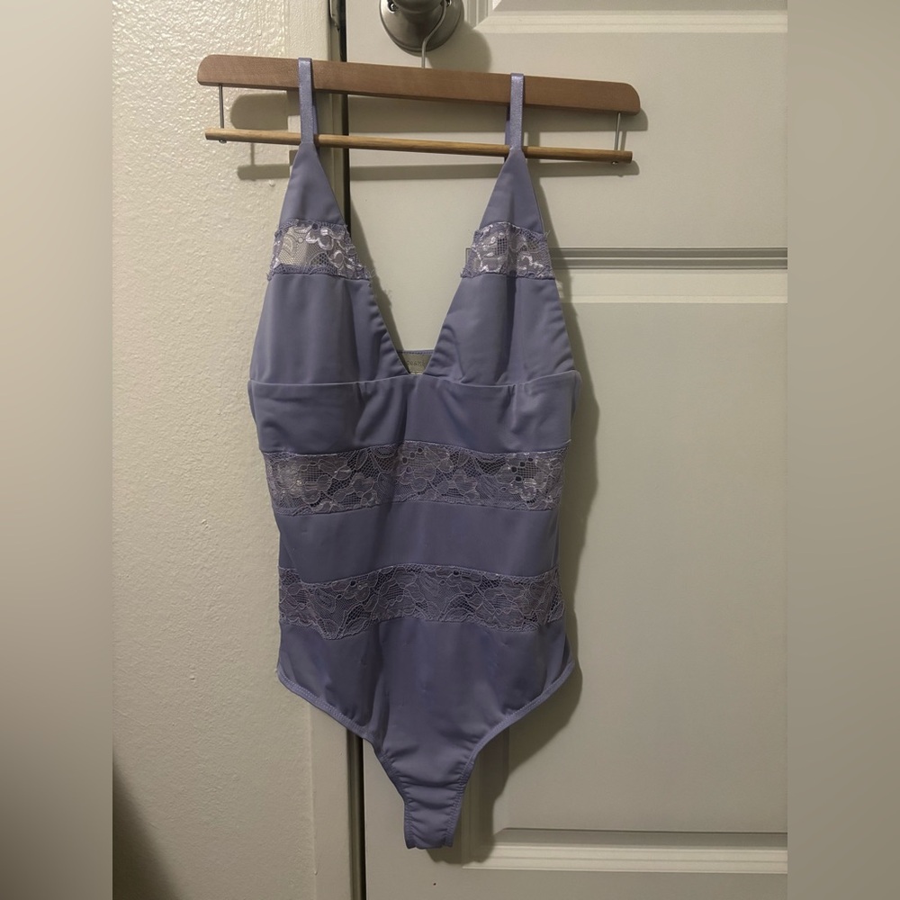 Purple bodysuit with lace accents